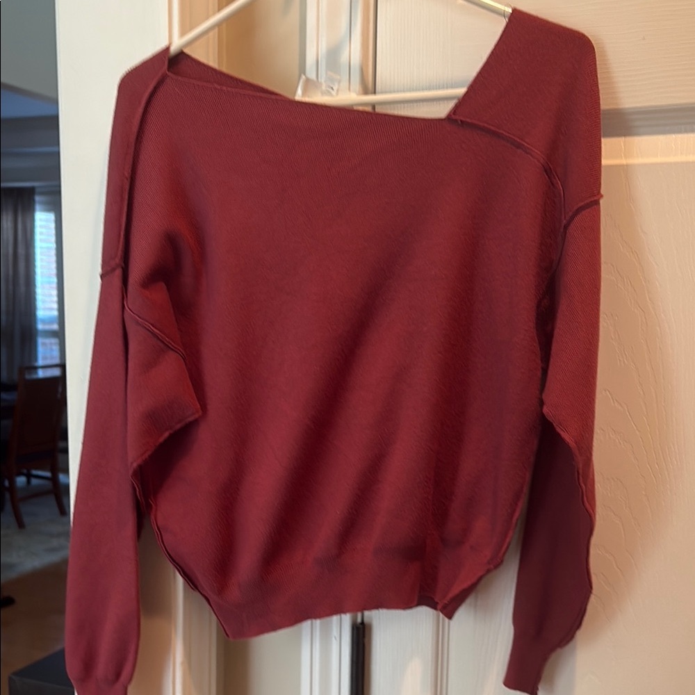 Women's asymmetrical neck burgundy sweater, ribbed. Contemporary